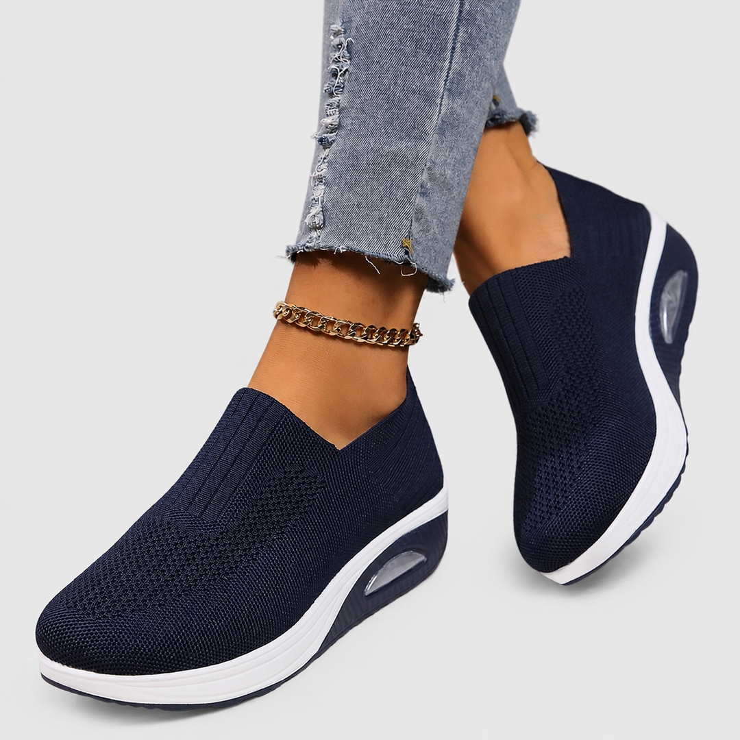 Women's orthopedic slip-on shoes, perfect for everyday wear, with cushioned arch support & flexibility.