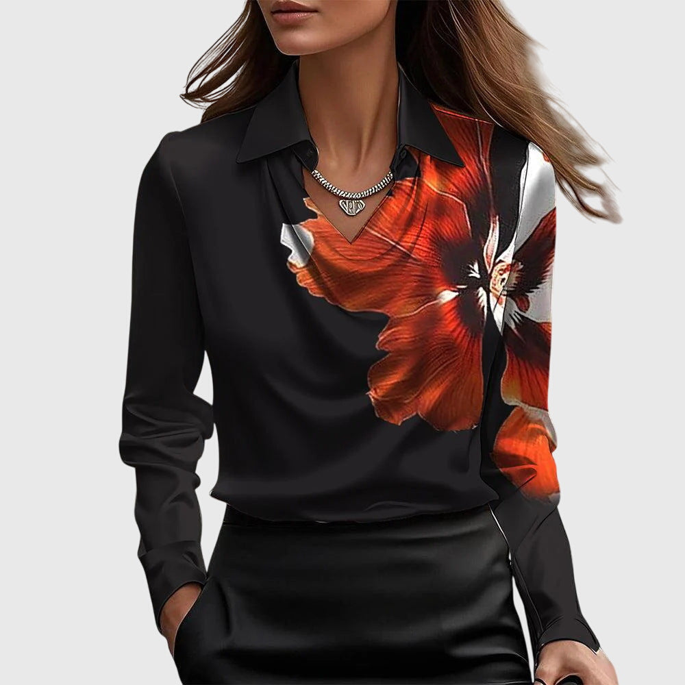 Close-up of elegant pleated neckline on a women's flowing fit blouse, perfect for sophisticated office wear.