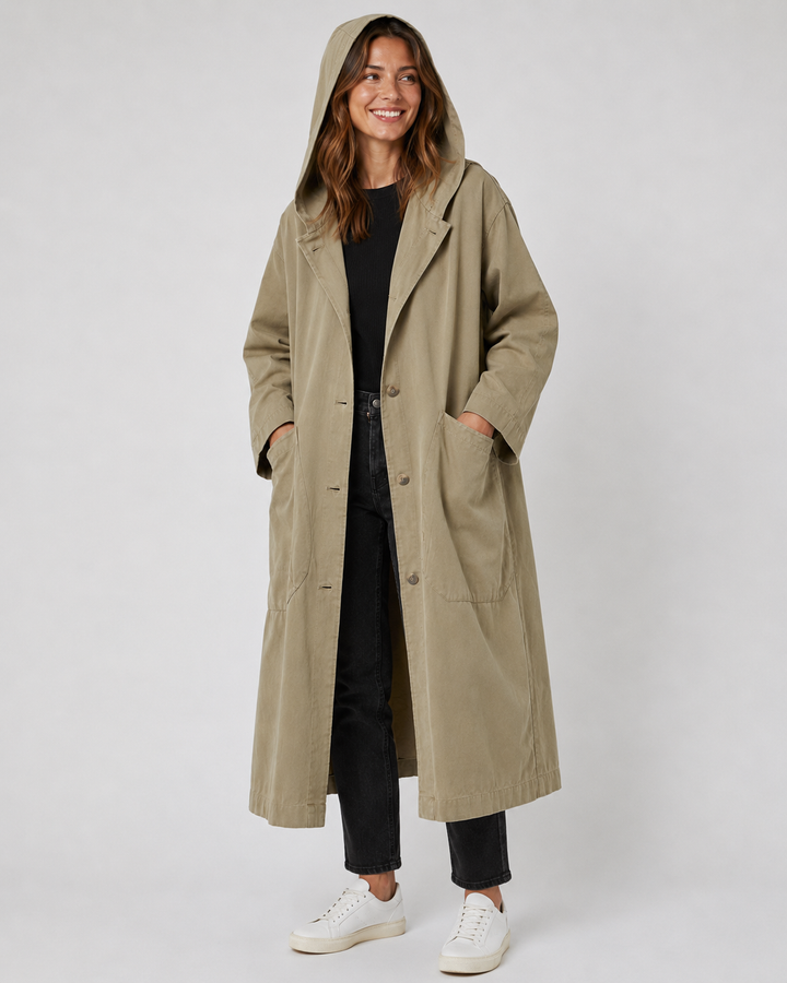 Elegant women's long trench coat. Waterproof, stylish, and versatile, ideal for sophisticated all-weather fashion.