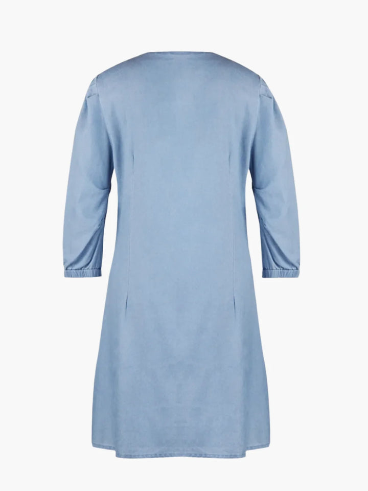 Stylish V-neck casual dress with half sleeves, ideal for summer parties & day outings.