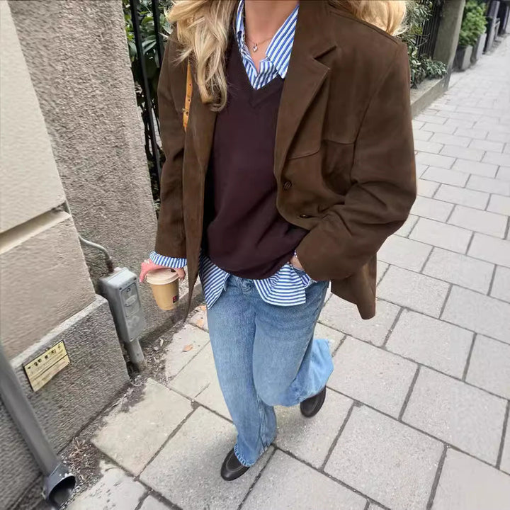 Front view: Women's one-button blazer, showcasing its elegant design, classic style & comfortable fit.