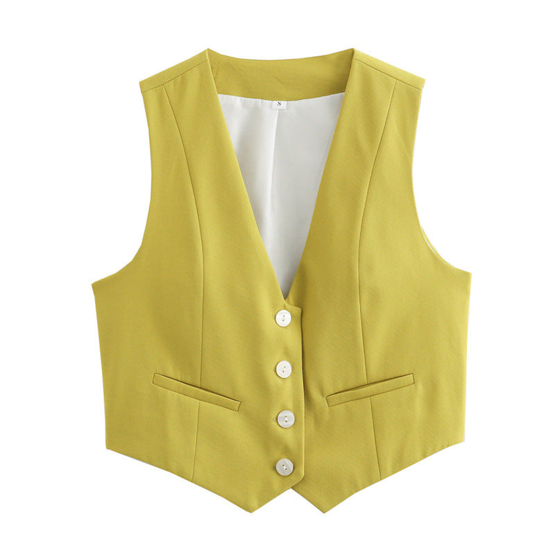 Close-up of a women's tailored vest fabric, depicting its quality and structured weave.