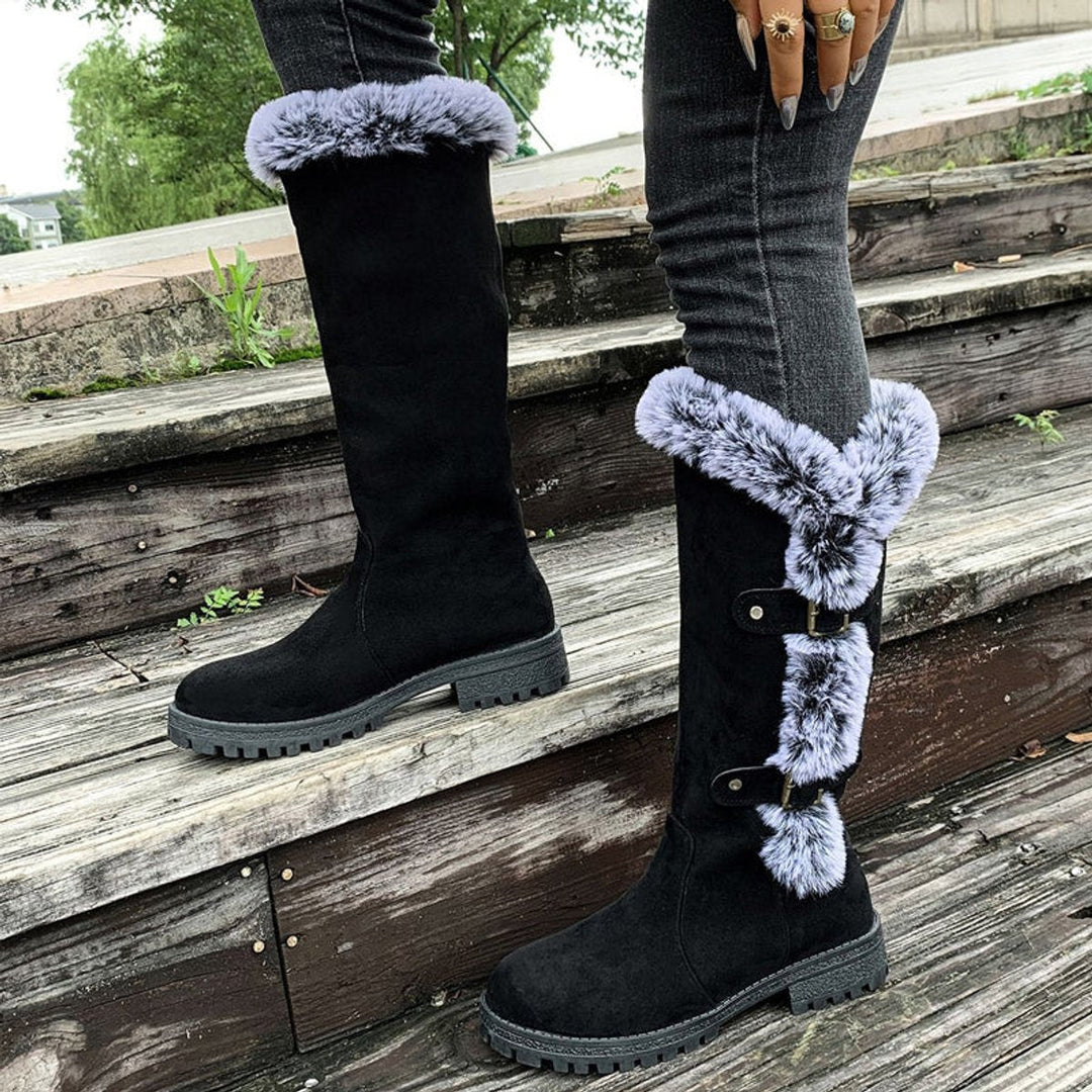 Casual women's buckle knee-high boots. Comfortable winter footwear, ideal for everyday seasonal style.