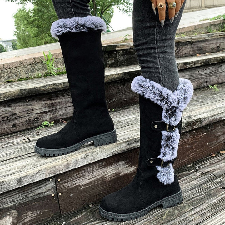 Casual women's buckle knee-high boots. Comfortable winter footwear, ideal for everyday seasonal style.