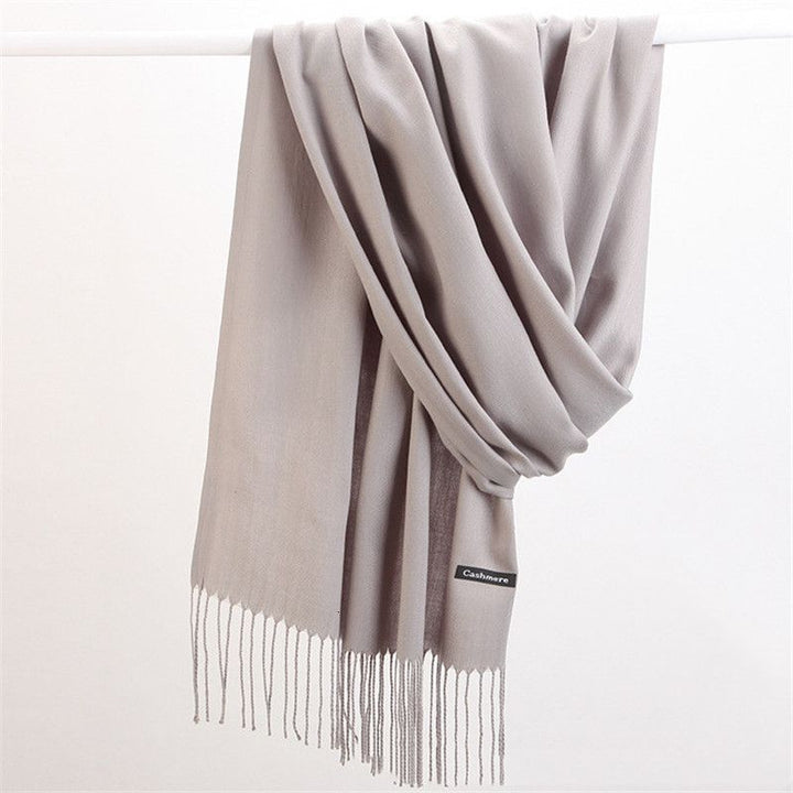 Elegant cashmere fashion scarf, a luxurious and warm accessory for women's winter wardrobe.
