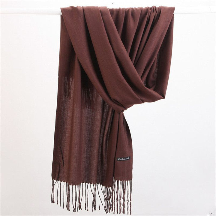 Fashionable oversized cashmere scarf, an elegant and warm accessory for women's luxury collection.