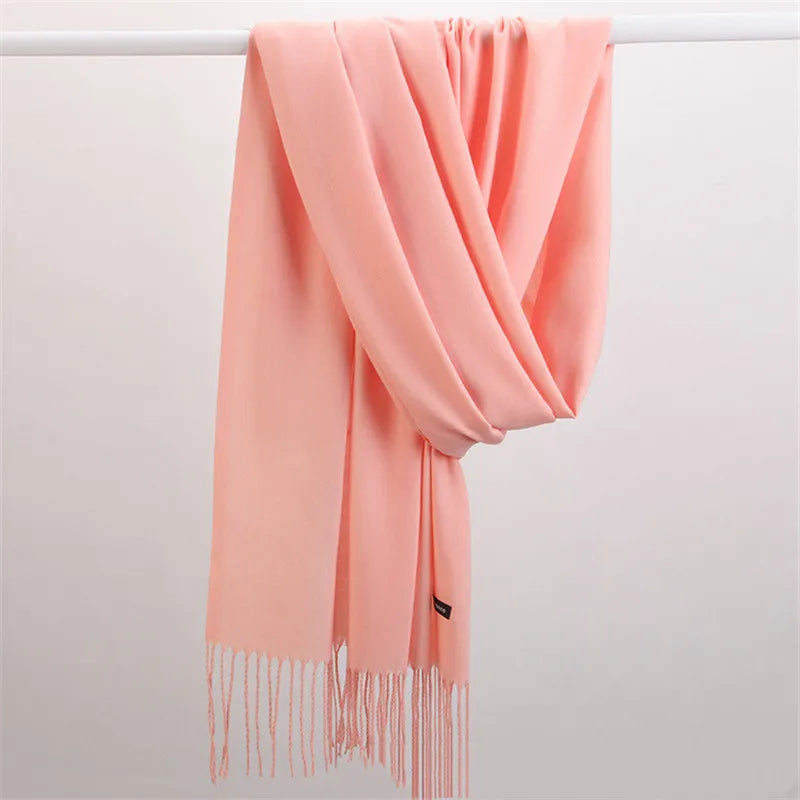 Elegant solid color cashmere scarf for women, a versatile and stylish fashion accessory.