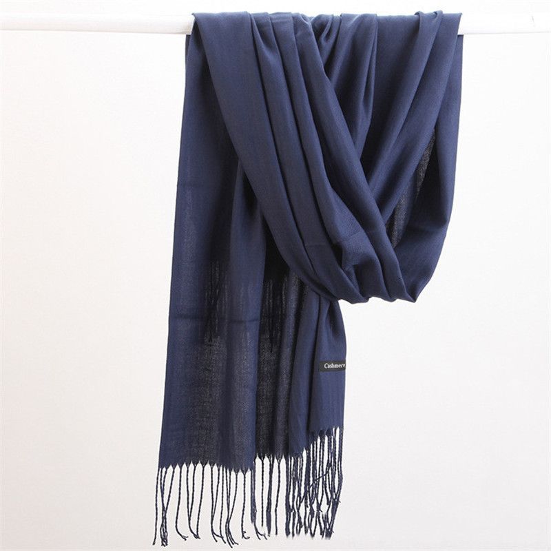 Warm women's cashmere wrap, an oversized and elegant fashion statement for any occasion.