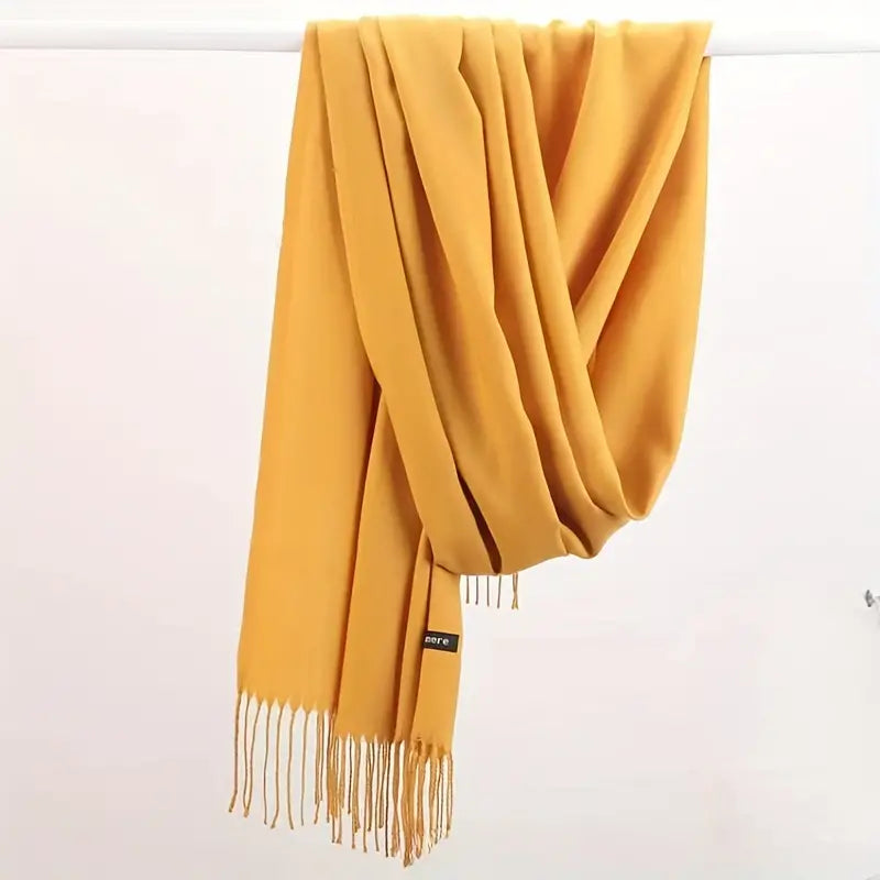 Cozy women's cashmere wrap, a stylish and warm winter accessory, perfect for layering.