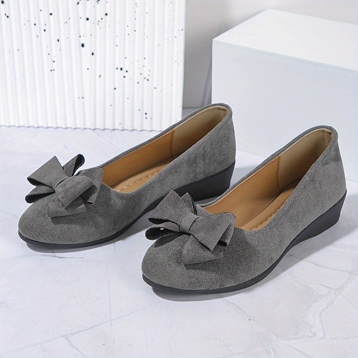 Brown comfortable women's wedge ballet flats, slip-on style with a cute bow for versatile outfits.