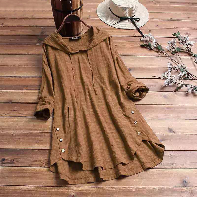 Stylish women's hooded long sleeve tunic featuring an asymmetric hem, ideal for comfortable autumn fashion.