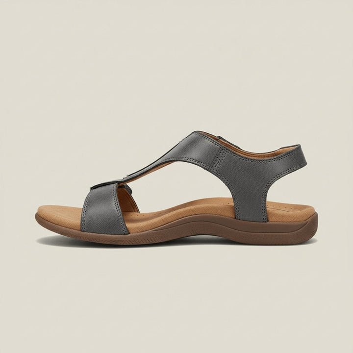 Women's everyday comfort T-strap sandals with an adjustable hook-and-loop for a perfect custom fit.