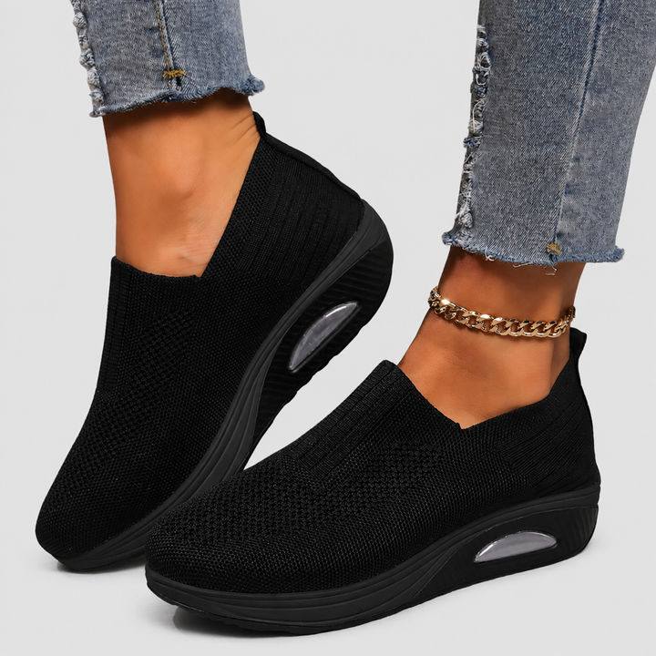 Women's orthopedic slip-on shoes with cushioned arch support, perfect for everyday comfort.