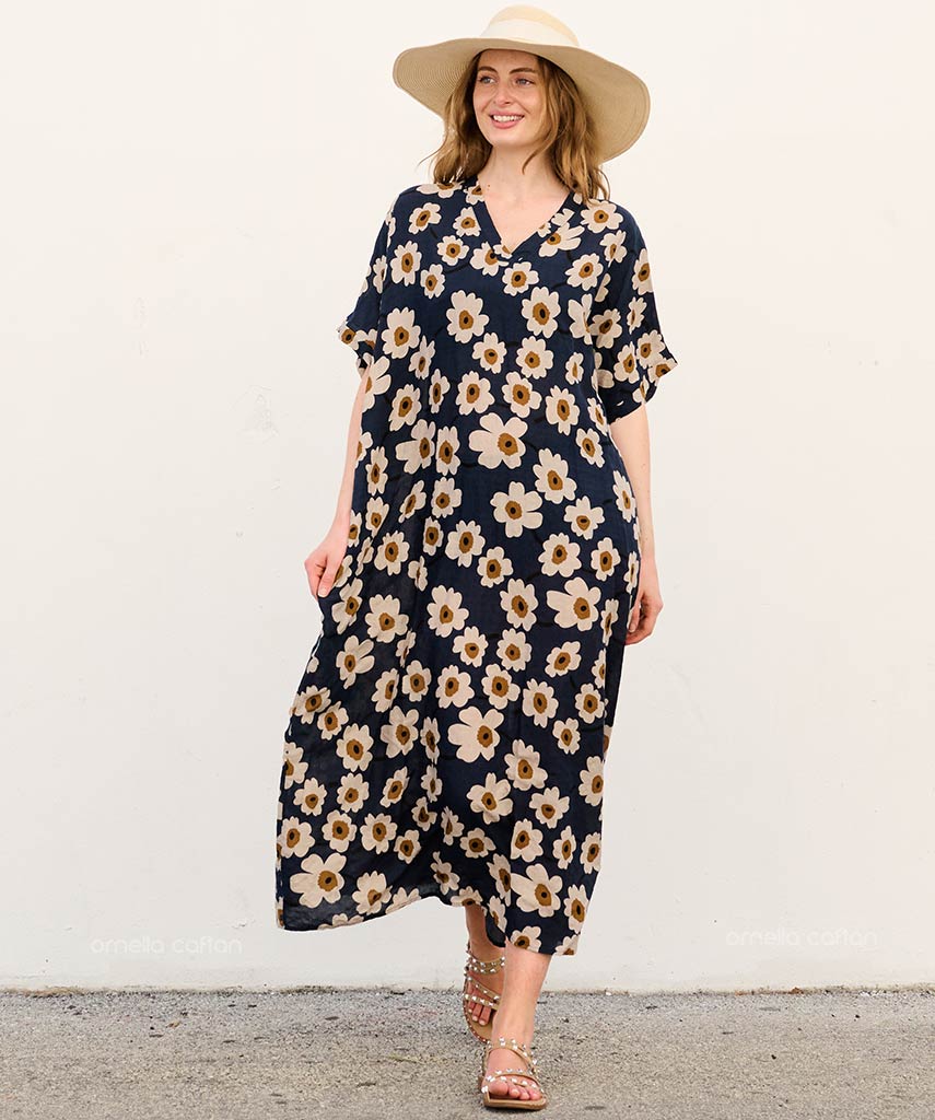 Women's flowing floral maxi caftan dress with V-neck. Perfect comfortable and elegant summer style.
