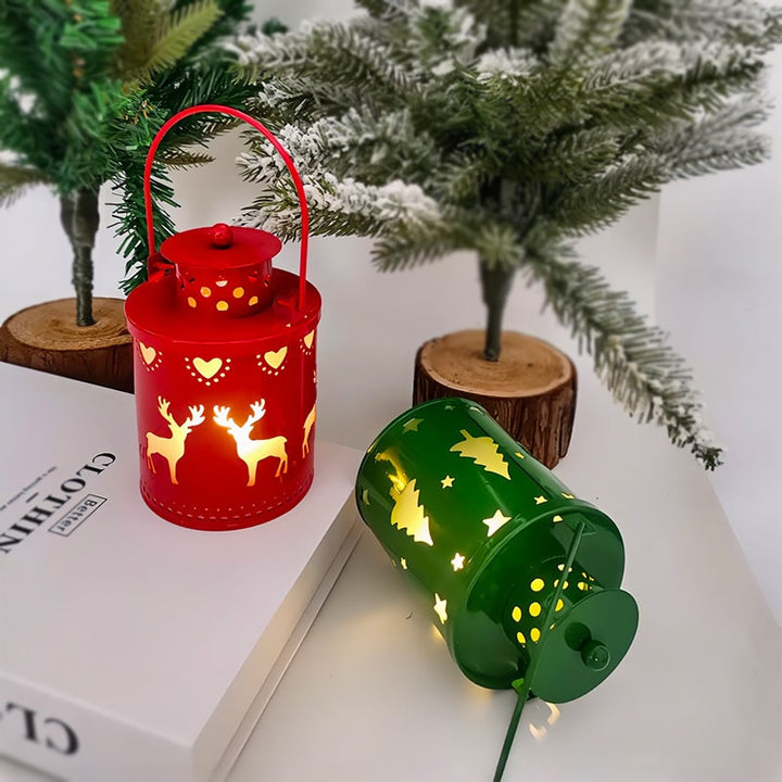 Festive LED Christmas lantern. Decorative metal frame for holiday ambiance and tabletop decor.