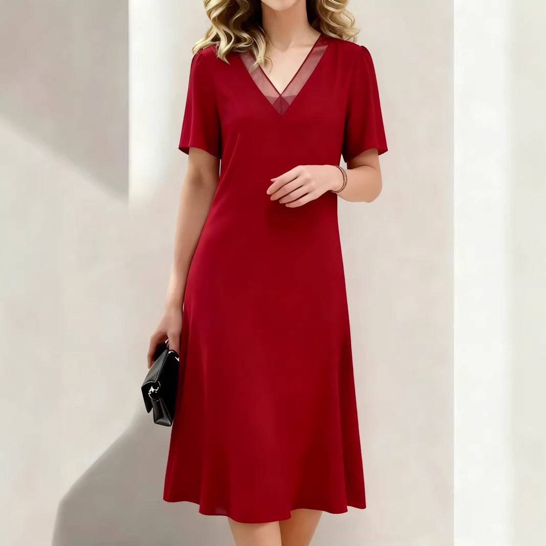 Women's V-neck short-sleeve flowing midi dress, perfect for casual summer wear and relaxed fit.