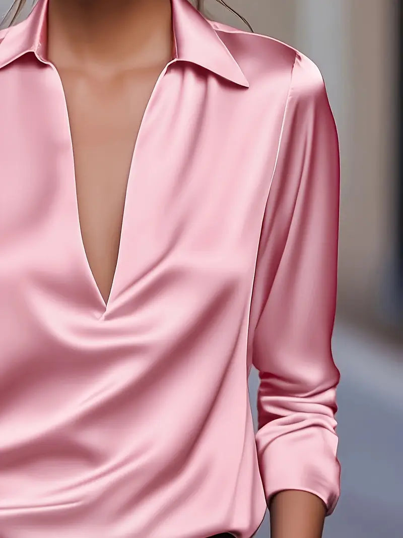 Casual chic women's V-neck blouse, long sleeve top offering everyday luxury.