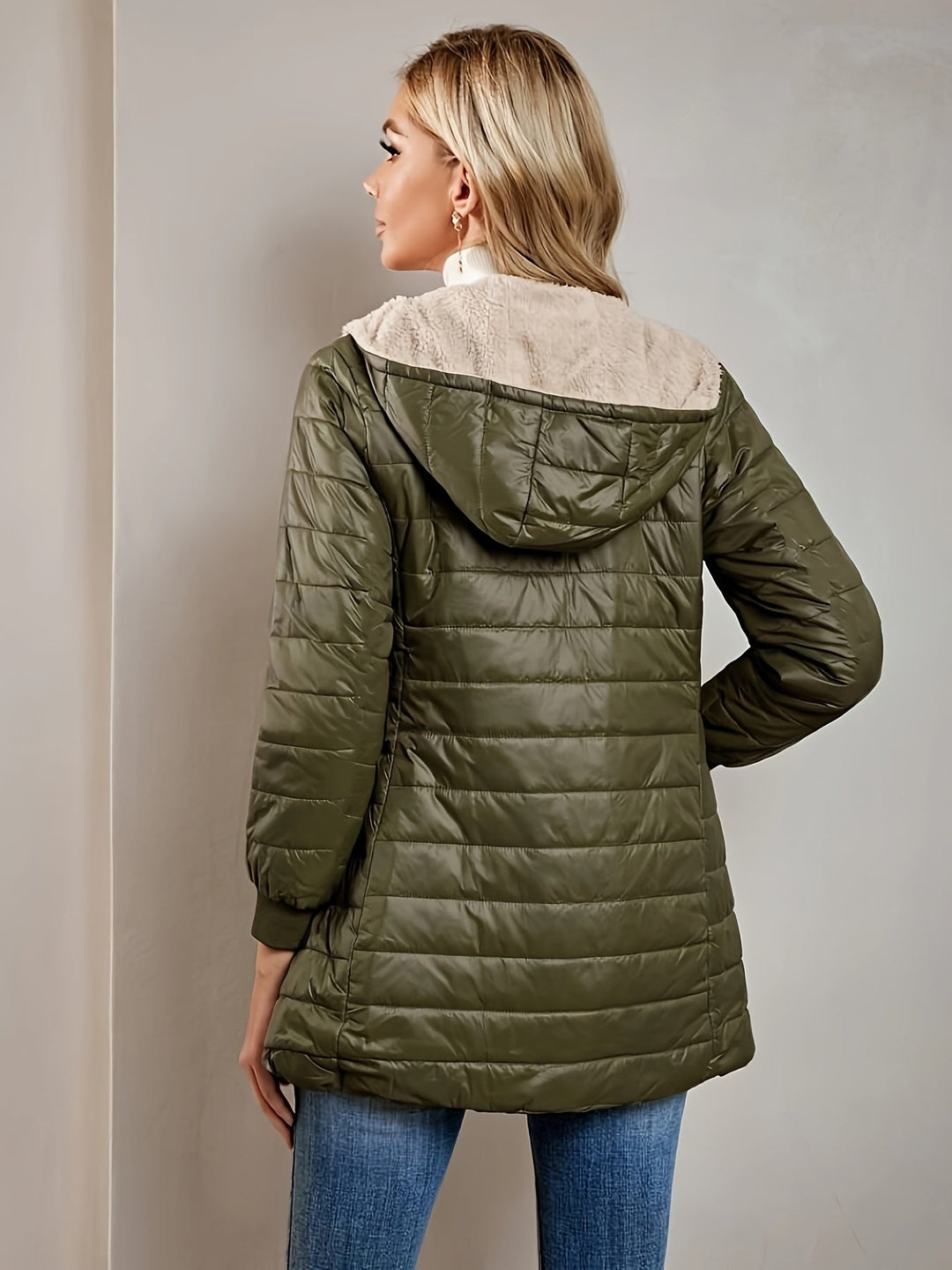 Full-length view of a women's casual fleece zip-up jacket, ideal for cold weather and fall fashion.
