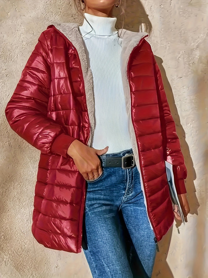 Women's warm fleece-lined zip-up jacket, perfect for winter comfort and cold weather.