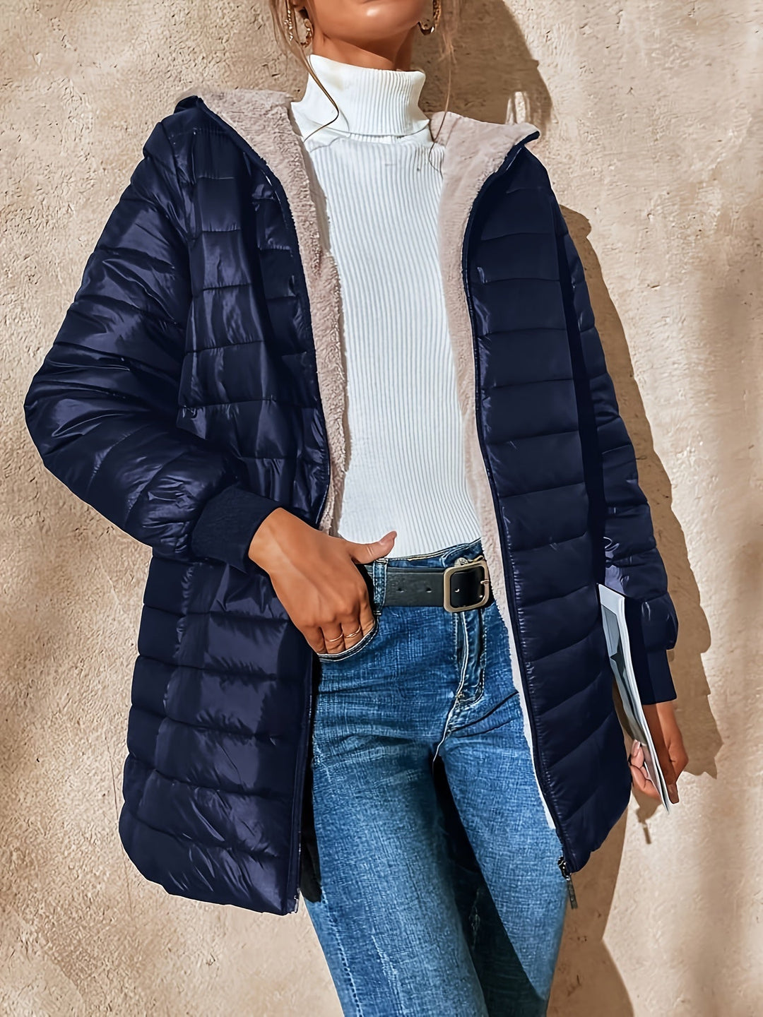 Comfortable women's outerwear: a warm fleece zip-up jacket, great for cold fall and winter days.