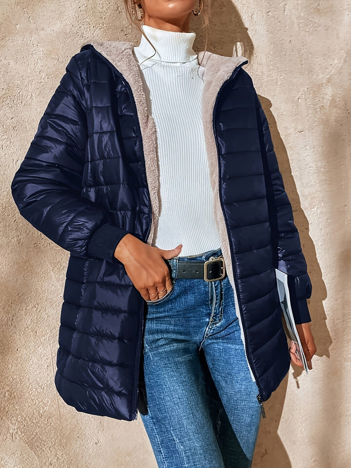 Comfortable women's outerwear: a warm fleece zip-up jacket, great for cold fall and winter days.