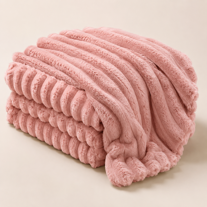 Cozy fleece throw blanket for bed or sofa. Provides warmth and soft comfort. Ideal home decor accent.