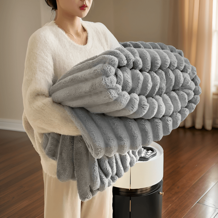 Comfortable plush fleece blanket, great for snuggling on the couch or as a bed throw.
