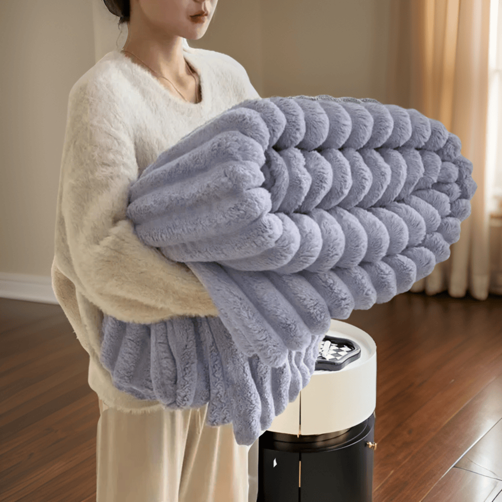 Plush fleece throw blanket, a cozy and decorative accent for modern home decor.