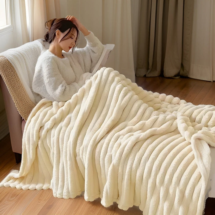 Ultra-soft plush fleece throw, a versatile home decor item for ultimate comfort and style.