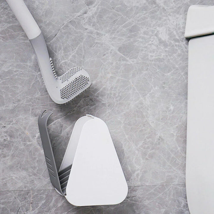 Durable flexible toilet brush with L-shaped head for deep, hygienic bathroom cleaning & germ elimination.