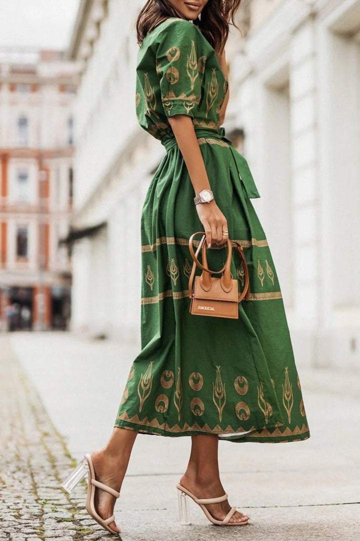 Women's mock neck geometric print midi cocktail dress, 3/4 sleeves, A-line silhouette, and flattering belted waist.