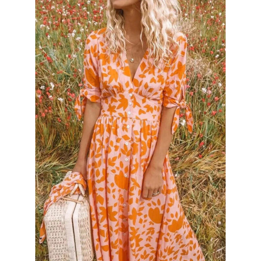 Orange Women's Flowing Maxi Dress with V-Neck and elegant Tie Sleeves. Perfect for summer, beach, or casual wear.