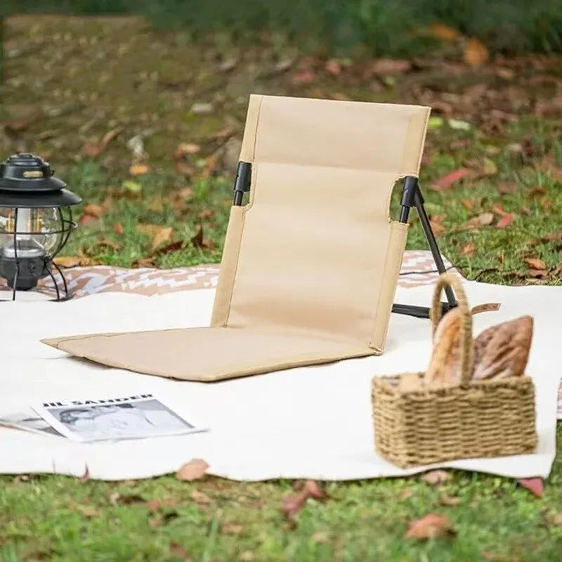 Versatile portable beach chair, doubles as a camping, lawn, or travel chair, offering comfortable outdoor seating.