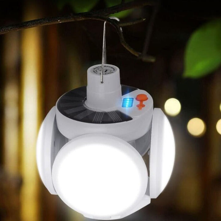 Portable solar LED bulb, multi-functional for camping, outdoor activities, and emergency illumination.