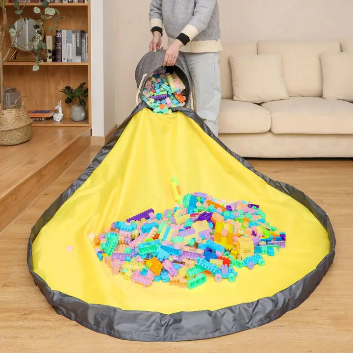 Foldable kids play mat & toy storage basket, perfect for nursery and quick toy cleanup.