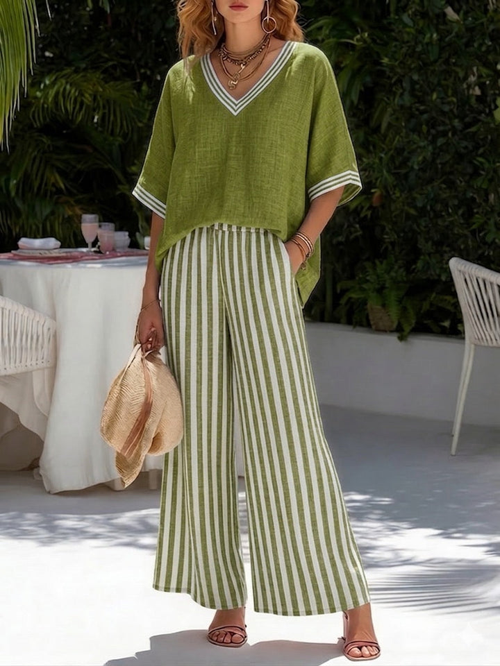 Effortless women's striped V-neck top & wide leg pants set, a chic casual outfit for spring and summer.