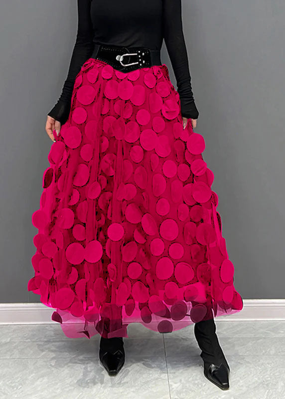 Chic polka dot A-line midi skirt, ideal for parties or elegant evening occasions, with a flowy texture.