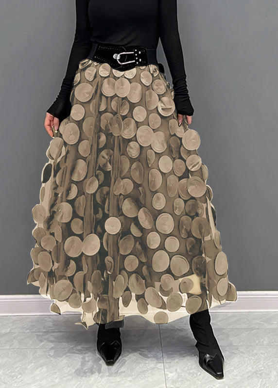 Textured high-waisted polka dot midi skirt, A-line cut, designed for elegant evening wear.