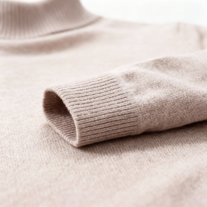 Grey men's comfortable knit turtleneck sweater, a versatile layering piece for smart or casual winter outfits.