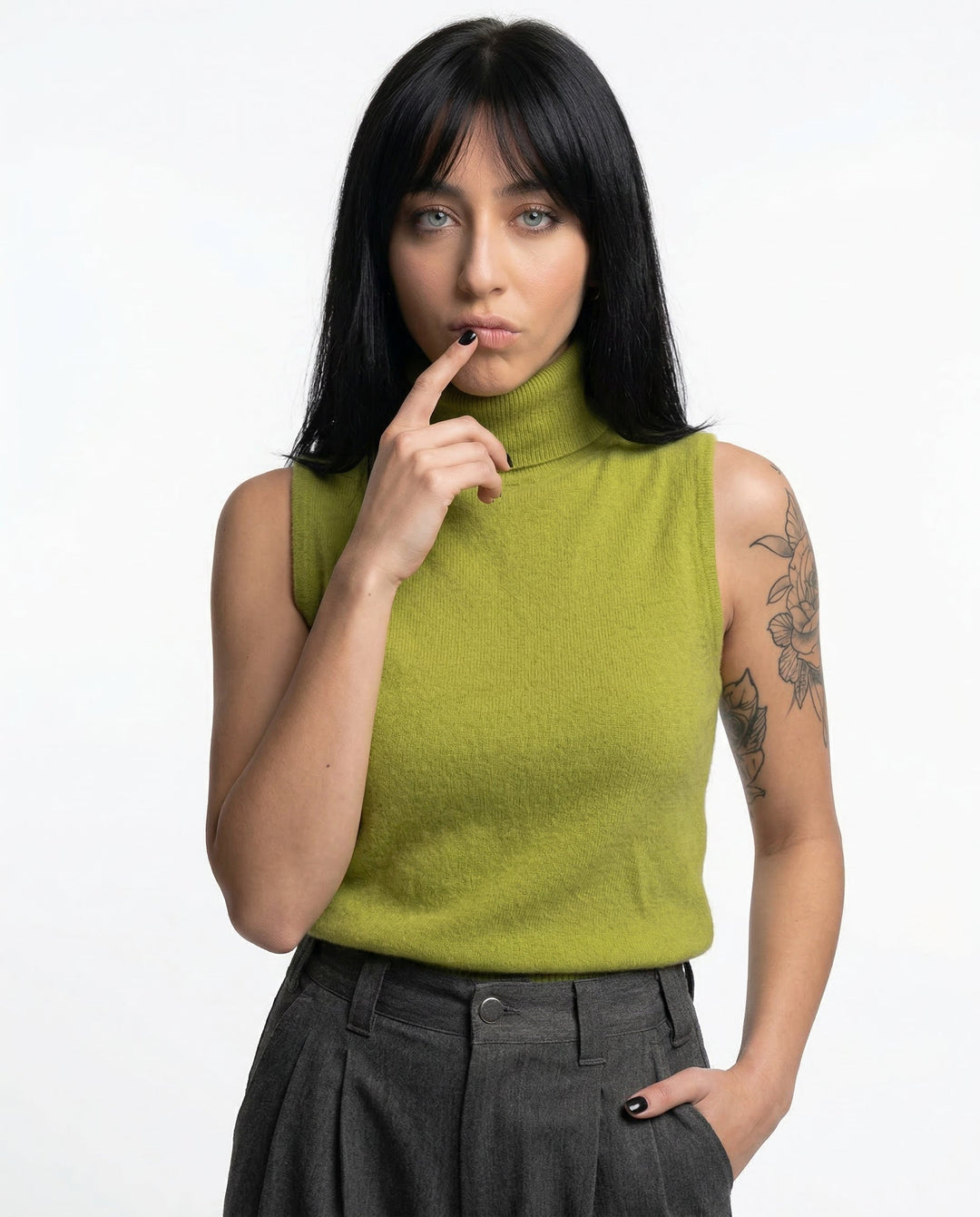 Elegant women's sleeveless top with a stylish turtleneck, ideal for versatile daily wear.