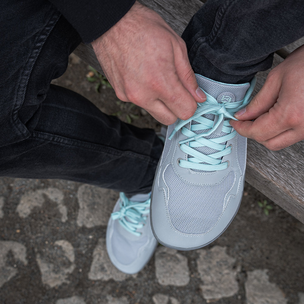 Active women's barefoot sporty trainers with a flexible, grippy sole. Water-resistant for versatility.