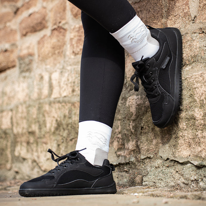 Agile women's barefoot sneakers, sporty water-resistant design with a responsive, flexible sole.