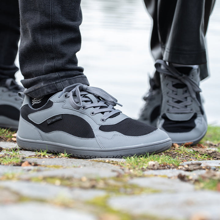 Minimalist women's barefoot trainers, lightweight construction for enhanced natural movement.