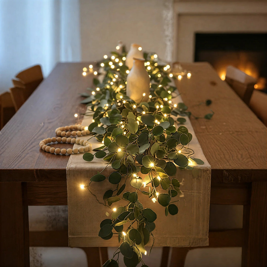 Warm white LED olive branch lights, battery operated for enchanting cordless home decor ambiance.