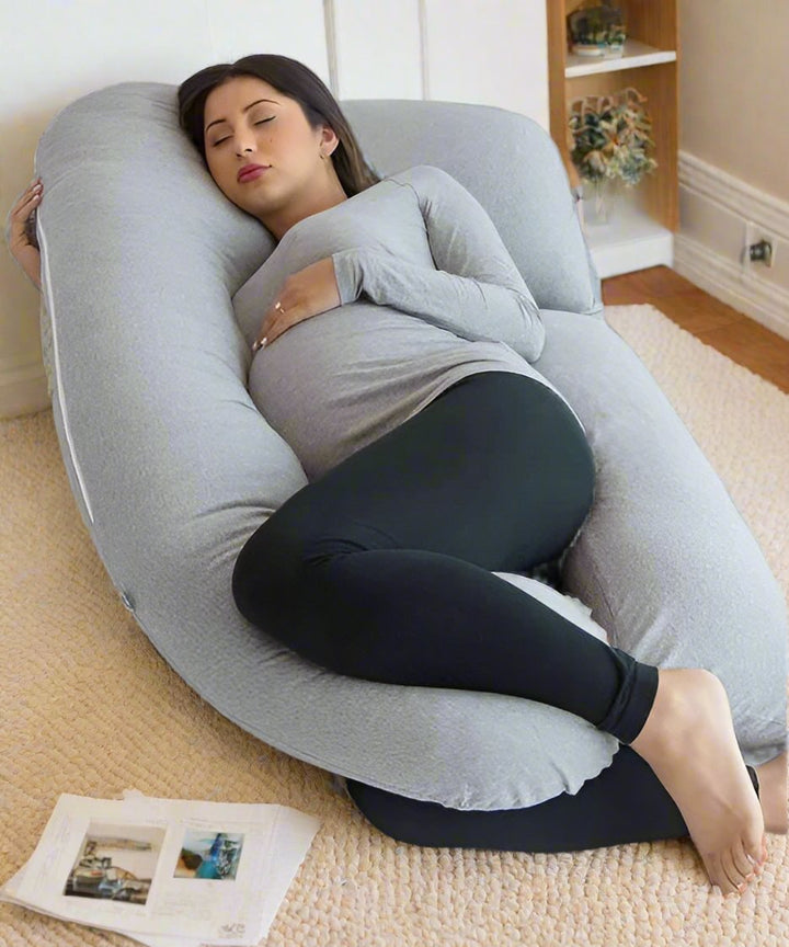 White full body support pillow, designed for side sleepers & pregnancy back pain relief.