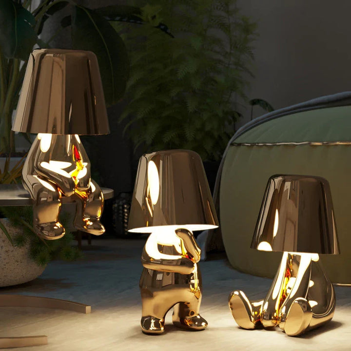 Artistic decorative LED figurine lamp, a modern cordless table light for unique home decor & gifts.