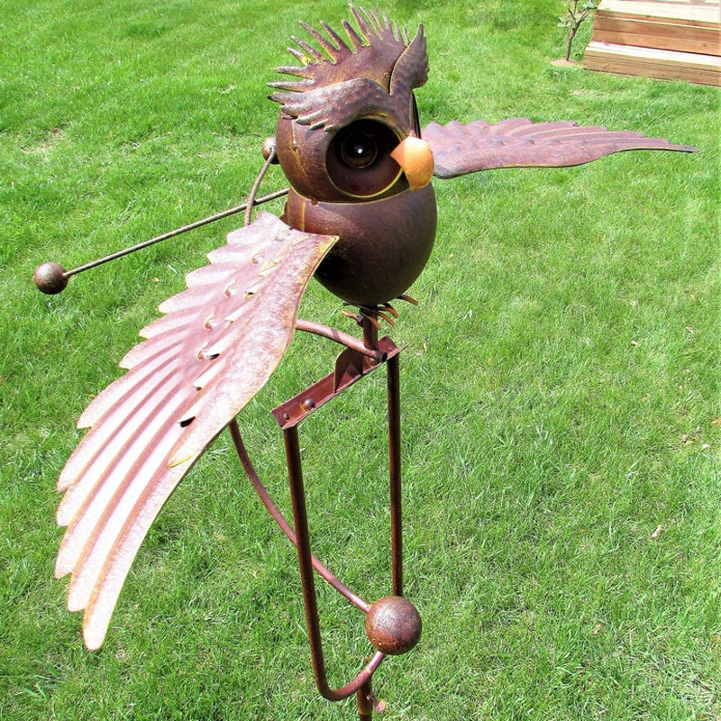 Elegant metal bird wind spinner outdoor art sculpture, perfect yard decor & garden gift.
