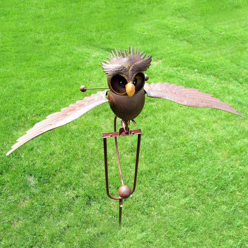 Whimsical owl bird wind spinner, weatherproof metal garden art & patio accent.
