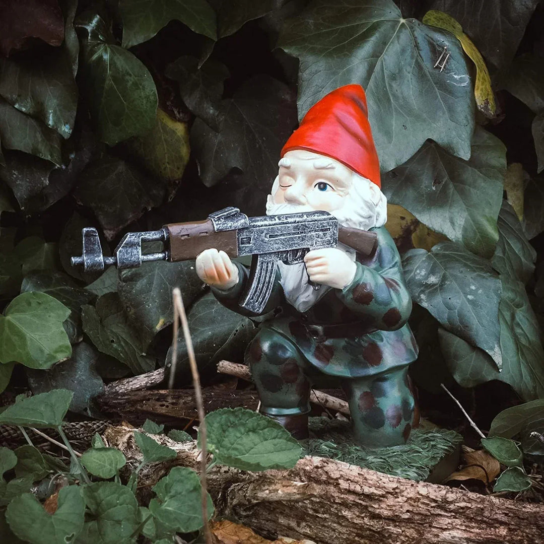 Funny garden gnome warrior statue, perfect whimsical lawn ornament for outdoor yard art.