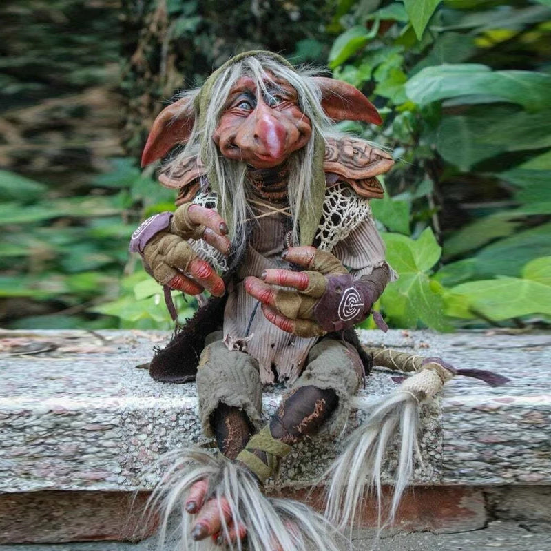 Detailed hard plastic goblin statue, an enchanting outdoor decoration for any fantasy garden.